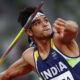 Neeraj Chopra preparing for his javelin throw at Paris 2024 Olympics